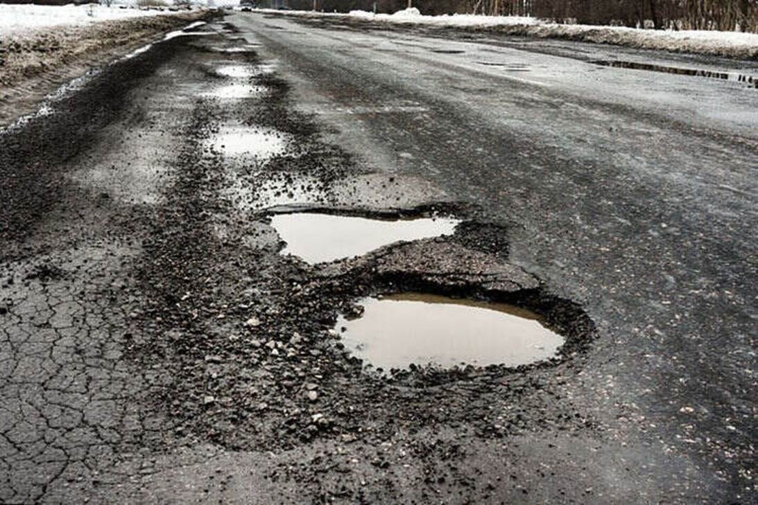Potholes on a road
AI-generated content may be incorrect.